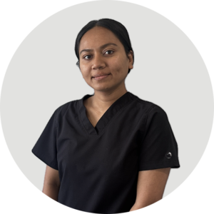 Professional headshot portrait of Dhvani Karkar, a female Registered Physiotherapist.